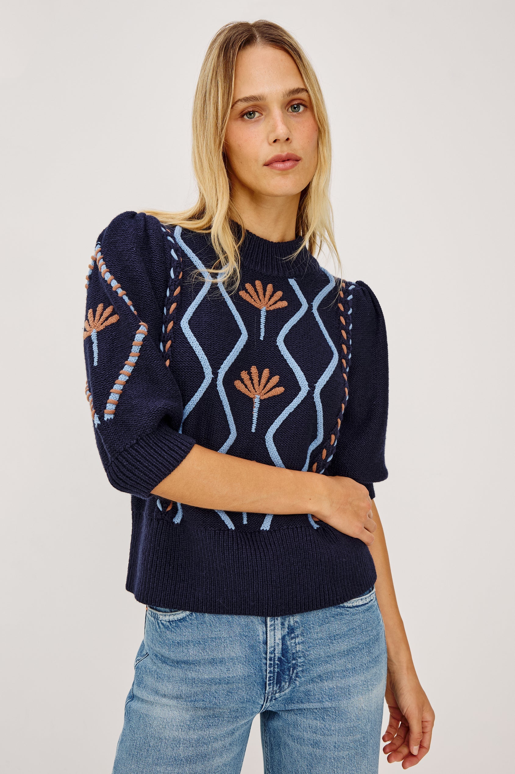 Addy - Floral Cables navy sweater with puff sleeves and floral geometric cable knit by RAILS
