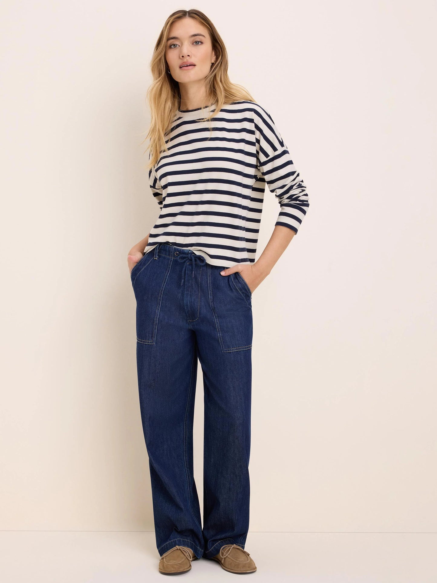 Soft Stripe Tee in navy and white stripes styled with relaxed denim pants by NIC AND ZOE