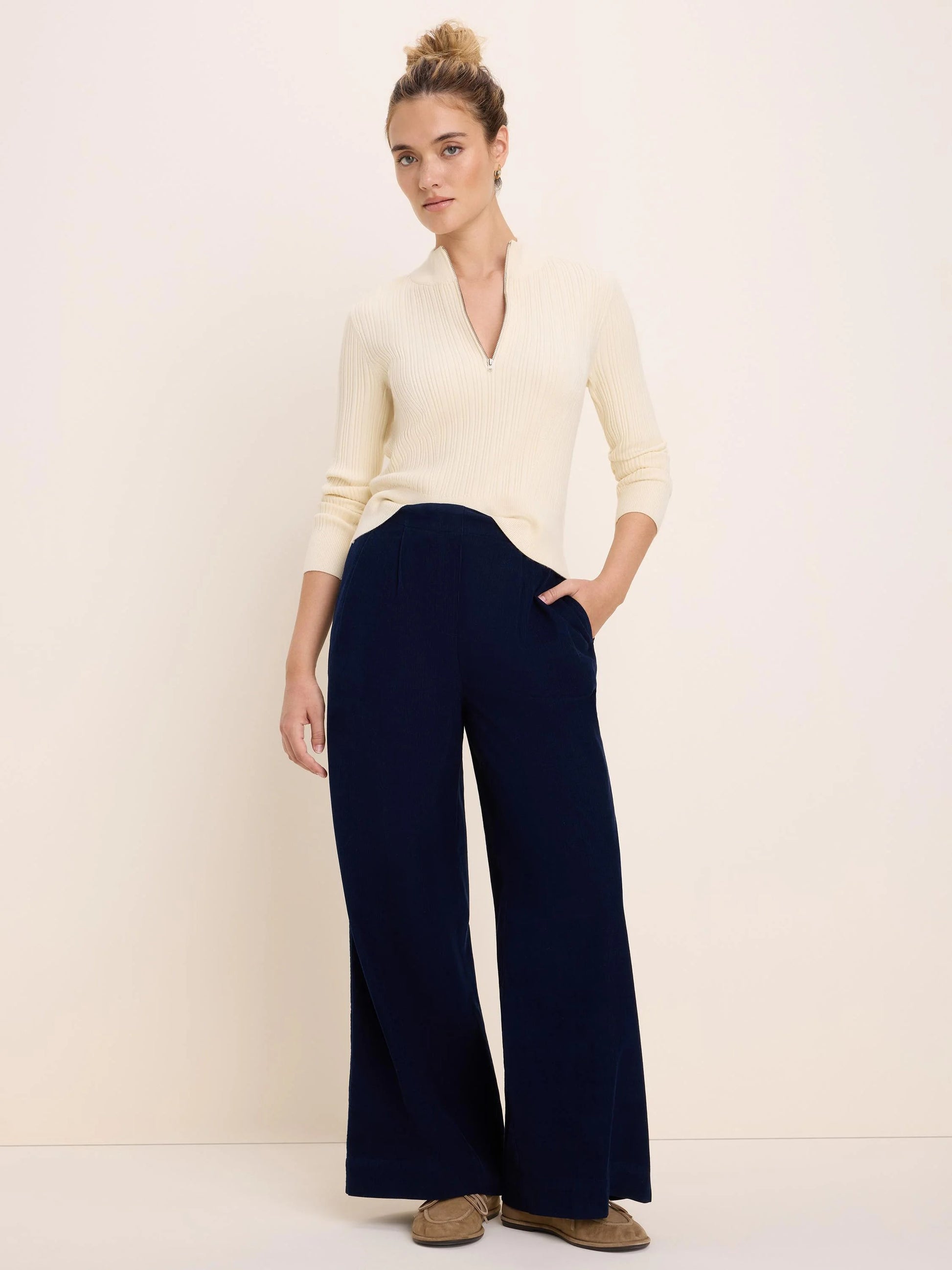 Half Zip Ribbed Sweater in cream knit styled with navy wide-leg pants by NIC AND ZOE boutique