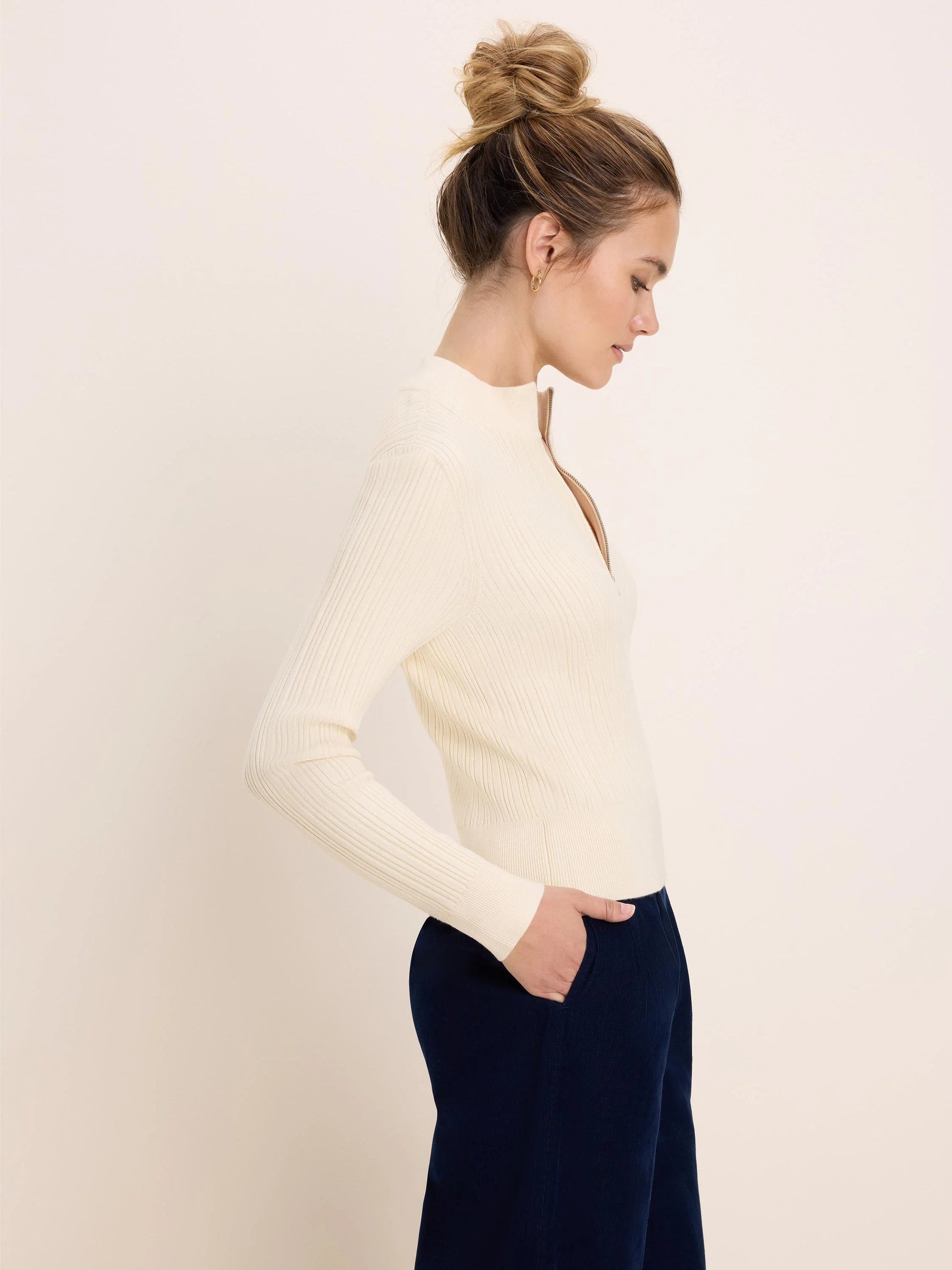 Half Zip Ribbed Sweater in cream knit styled casually with navy pants by NIC AND ZOE boutique