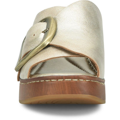 Bangle slide in metallic silver with statement buckle and woodgrain-inspired platform by BORN