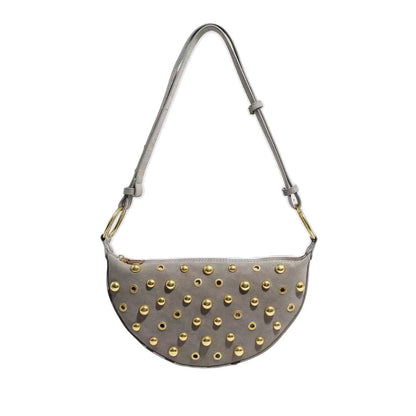 Maeve Studded Bag in gray with gold-tone eyelet studs and adjustable shoulder strap