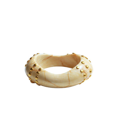 Bondi Bangle in ivory resin with gold plating, studded design from ACCESSORY CONCIERGE
