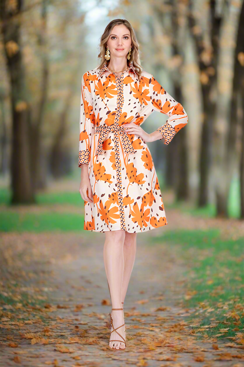 Wild Ember contrast shirtdress with orange-and-white floral print, belted waist, long sleeves