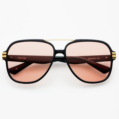 Spencer sunglasses with black and gold frame and rose-tinted lenses, showcasing a sleek, durable design for effortless Hill Country style, curated in Fredericksburg, Texas.