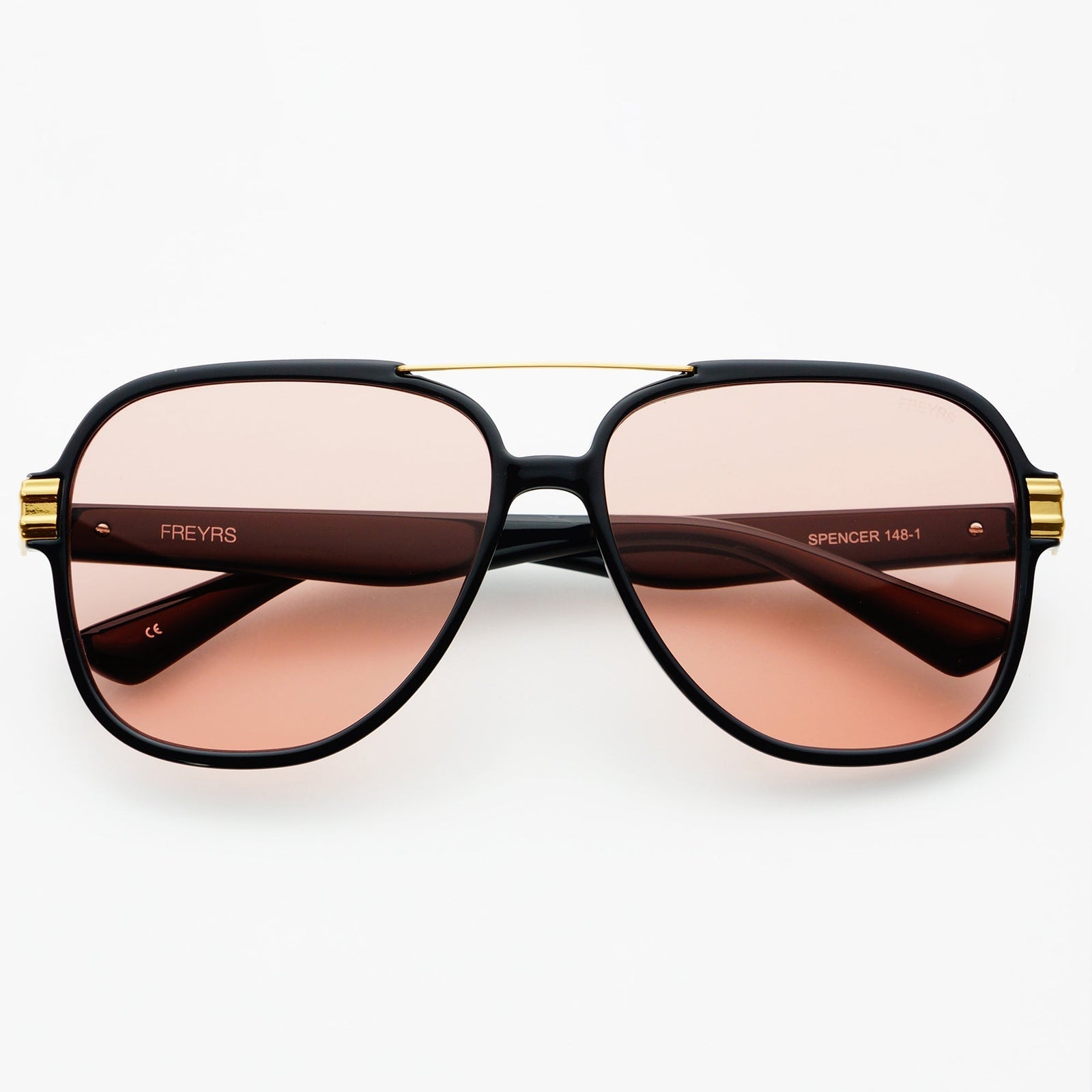 Spencer sunglasses with tortoiseshell frames, gold metal brow bar, and purple-tinted lenses, blending high-quality design with effortless Hill Country style.