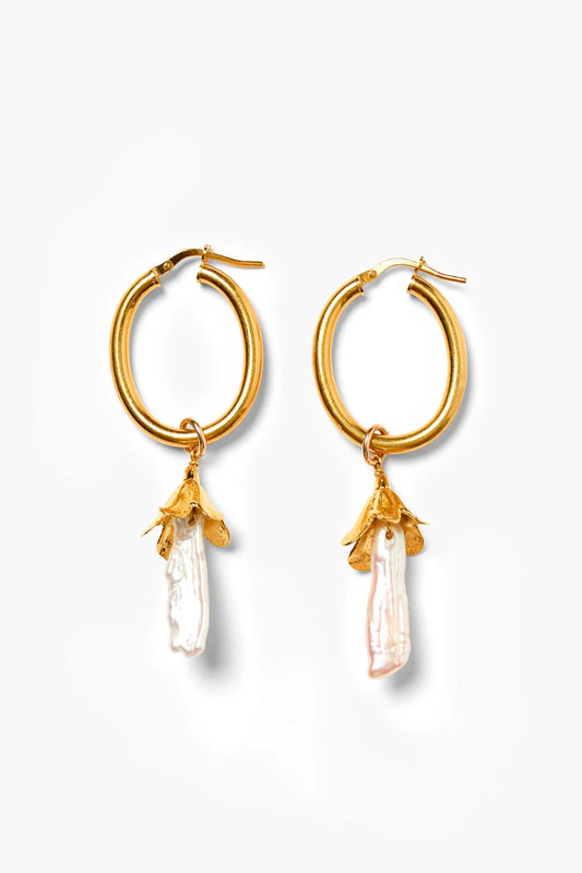 Gold hoop earrings with white pearl bellflower charms, dangling drops
