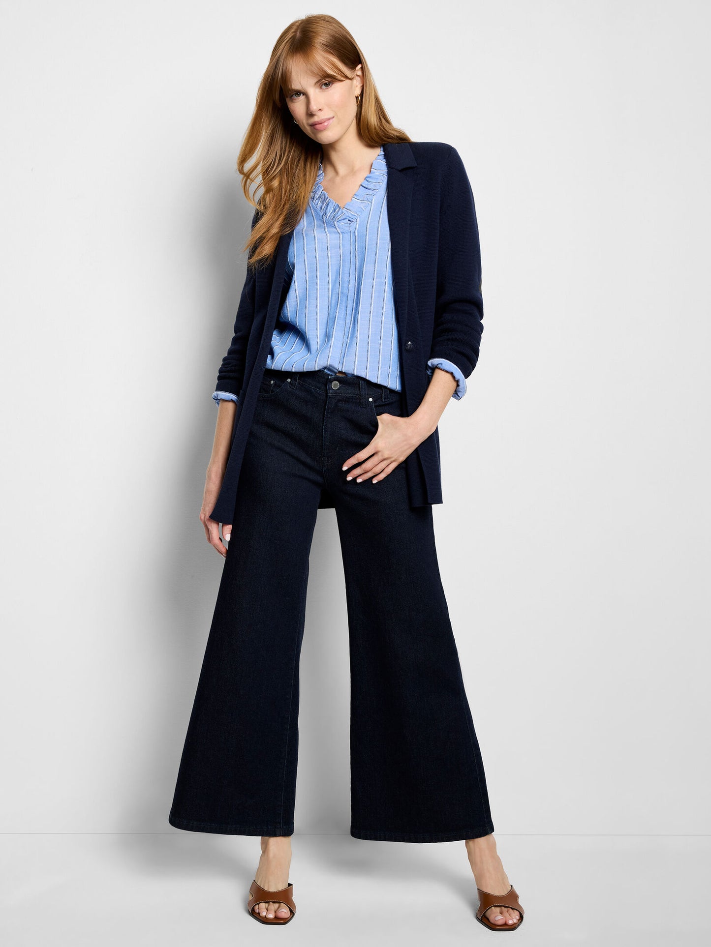 Dark indigo knit blazer with open front and side pockets, long sleeves