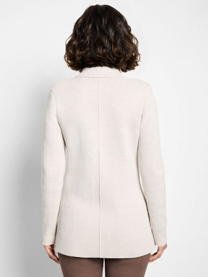 Back view of sugar cookie knit blazer with center seam and long sleeves