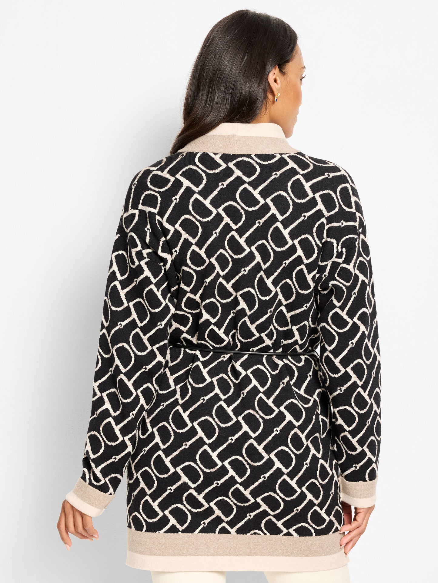 Back of belted equestrian jacket, black linked print with beige hem band