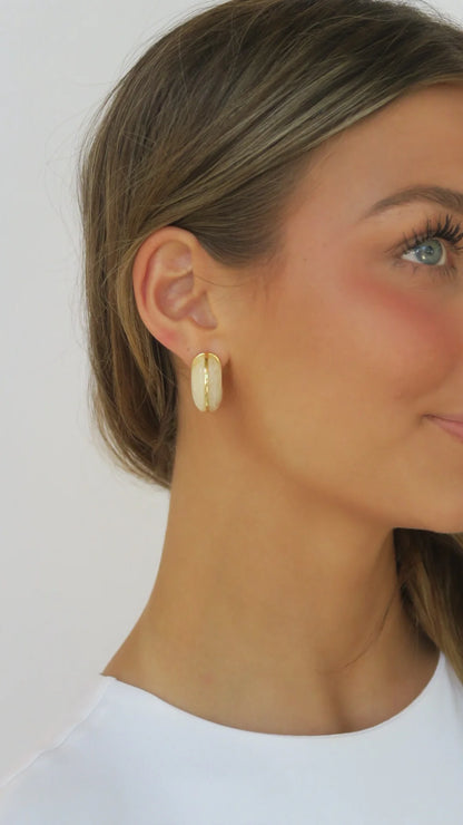 Carson Hoop earrings worn—ivory hoops with gold-tone rim and hinge backs