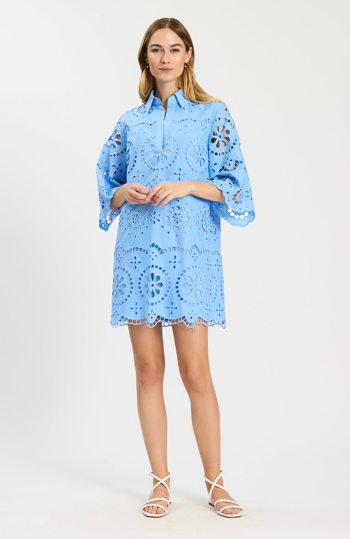 Penny Eyelet Dress in blue floral eyelet with scalloped edges and flared sleeves, Tyler Boe style
