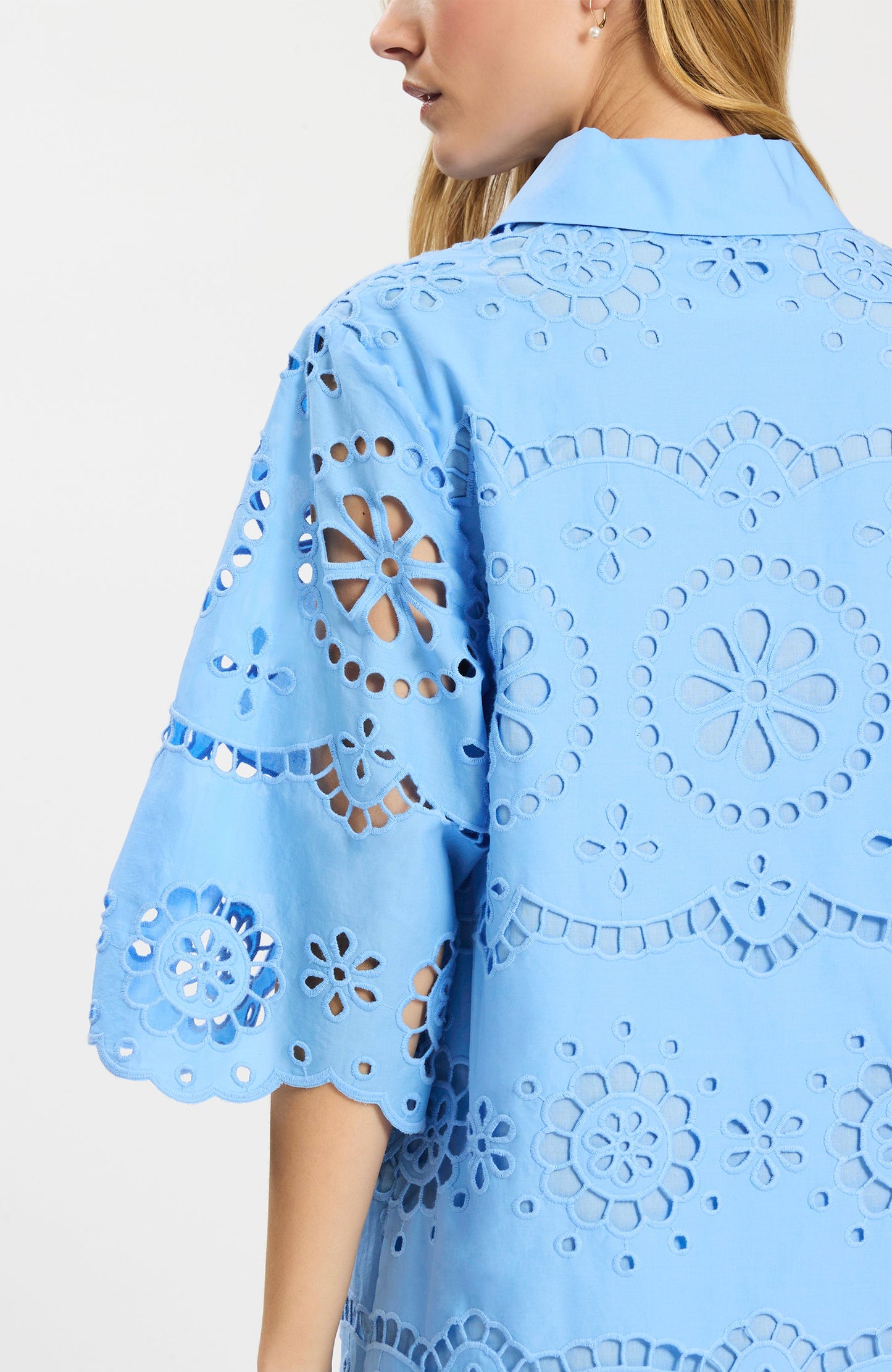 Penny Eyelet Dress in blue floral eyelet with scalloped sleeves, stylish Tyler Boe design