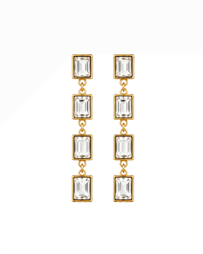 Gold-tone dangling earrings with four rectangular clear stones each