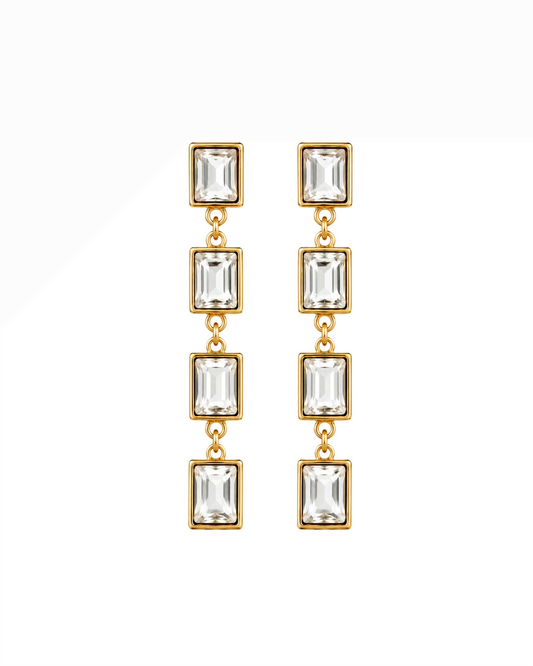 Gold-tone dangling earrings with four rectangular clear stones each