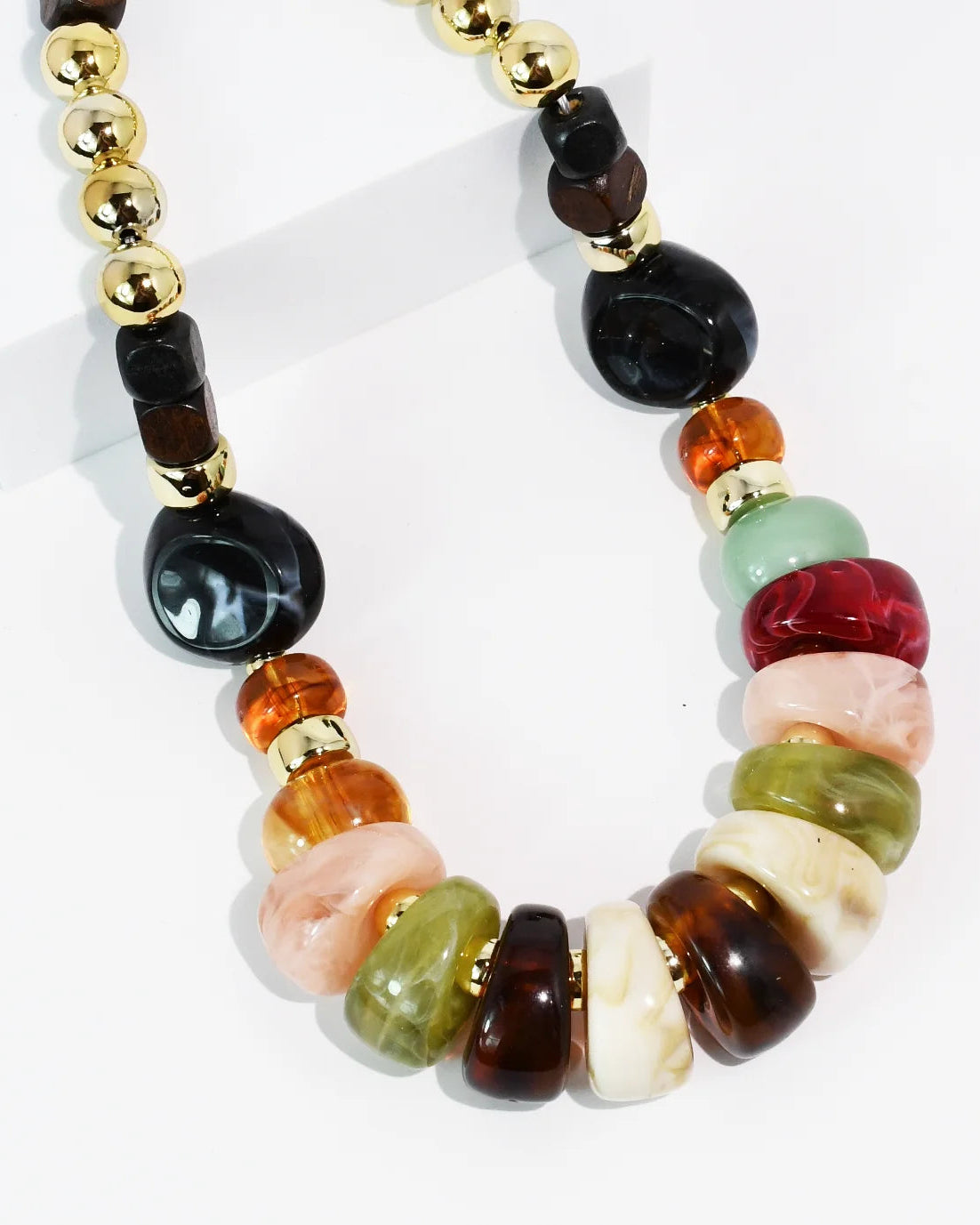 Treasure Palette Necklace with colorful beads and polished gold accents