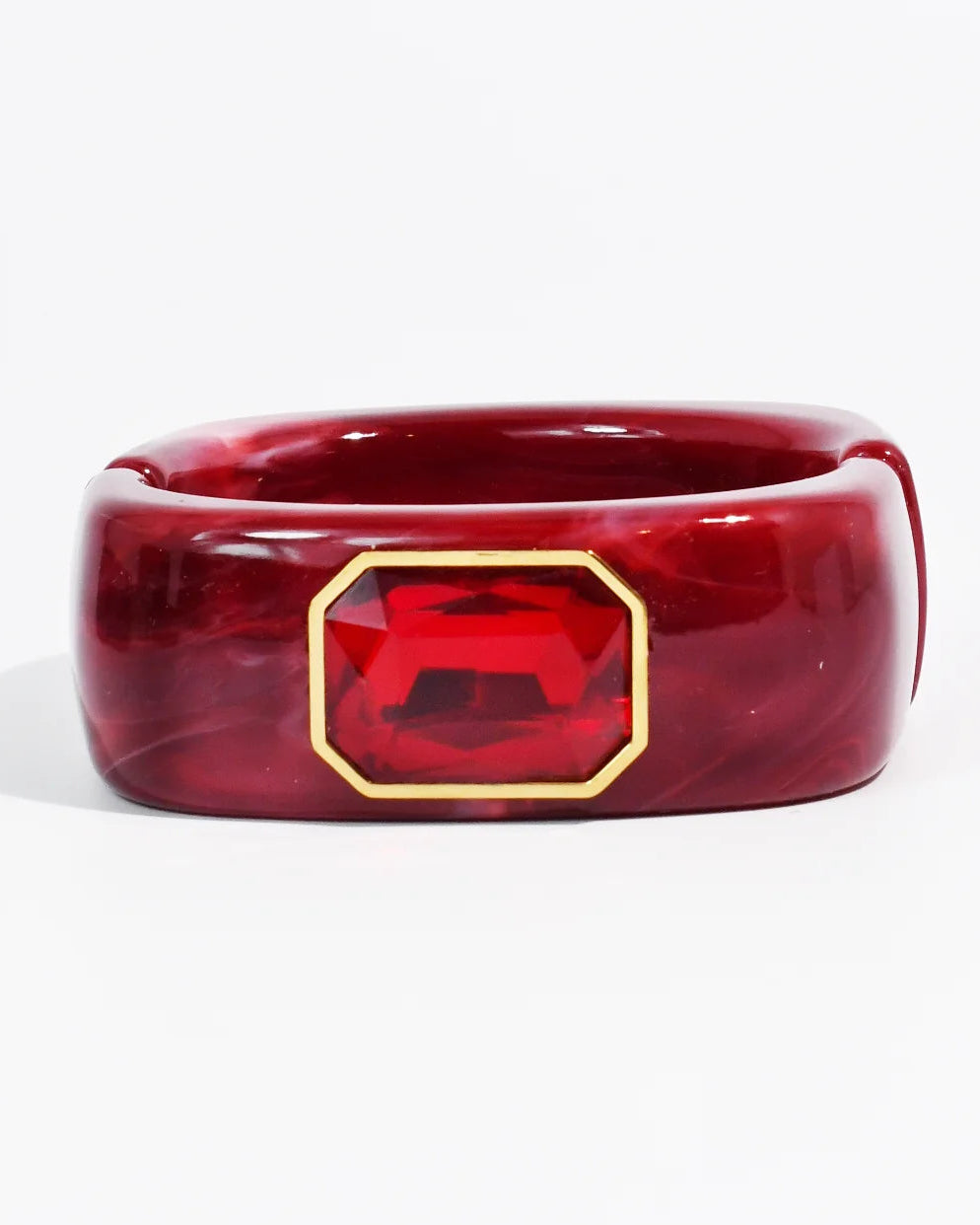 The Gemma Cuff Bracelet by TREASURE JEWELS with marbled resin band and emerald cut crystal