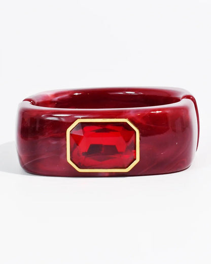 The Gemma Cuff Bracelet by TREASURE JEWELS with marbled resin band and emerald cut crystal