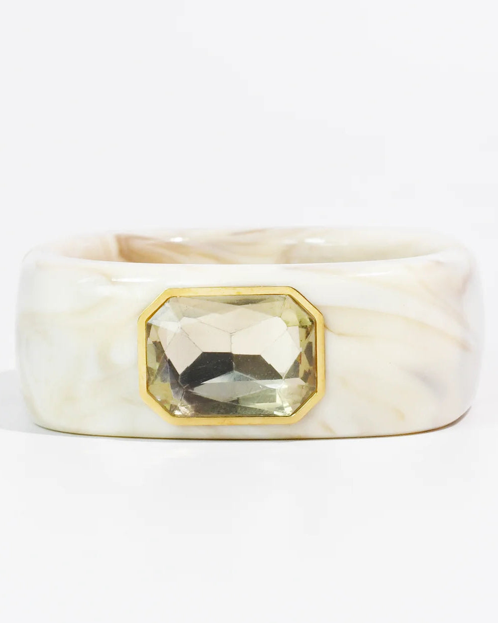 The Gemma Cuff Bracelet by TREASURE JEWELS with marbled resin and emerald cut crystal