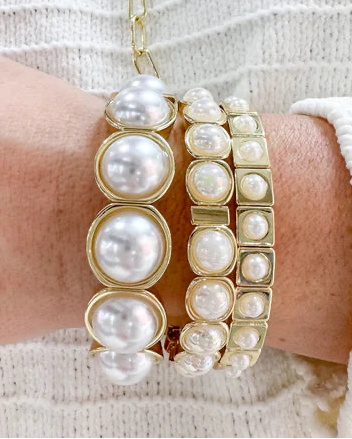 All The Pearls Stack Set with geometric gold settings and lustrous pearls by TREASURE JEWELS