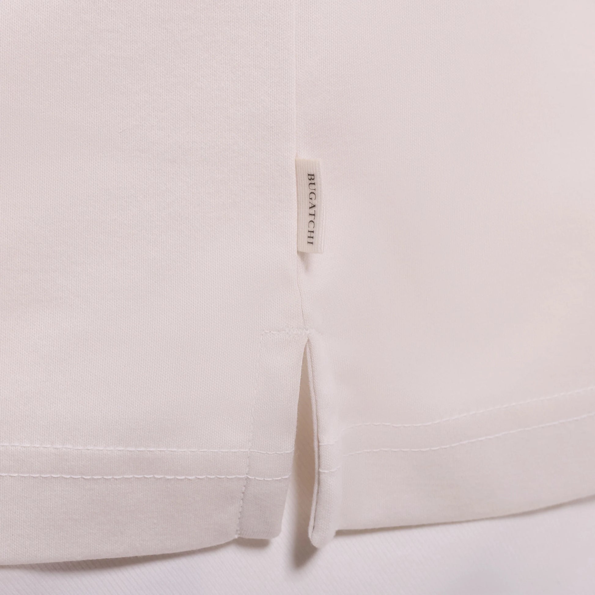 Solid Pima Johnny Collar Polo- Ivory with side vents and BUGATCHI label, men's short sleeve shirt