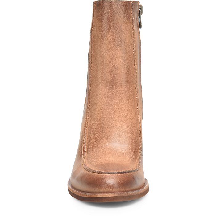 Brown leather boot side view with pull-tab zipper and stitched panel seams
