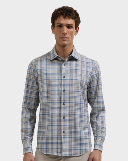 Man wearing a blue and gray plaid button-down shirt