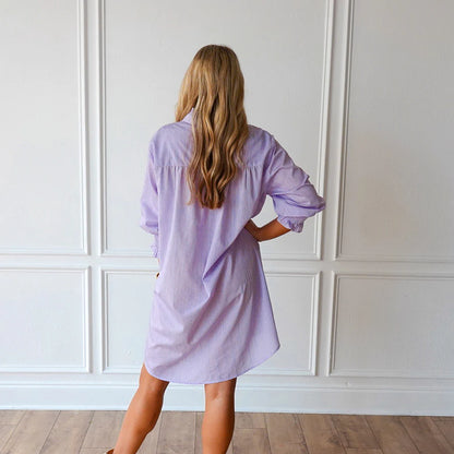 Back of Kimberly dress lavender stripe with ruffled shoulders and full sleeves