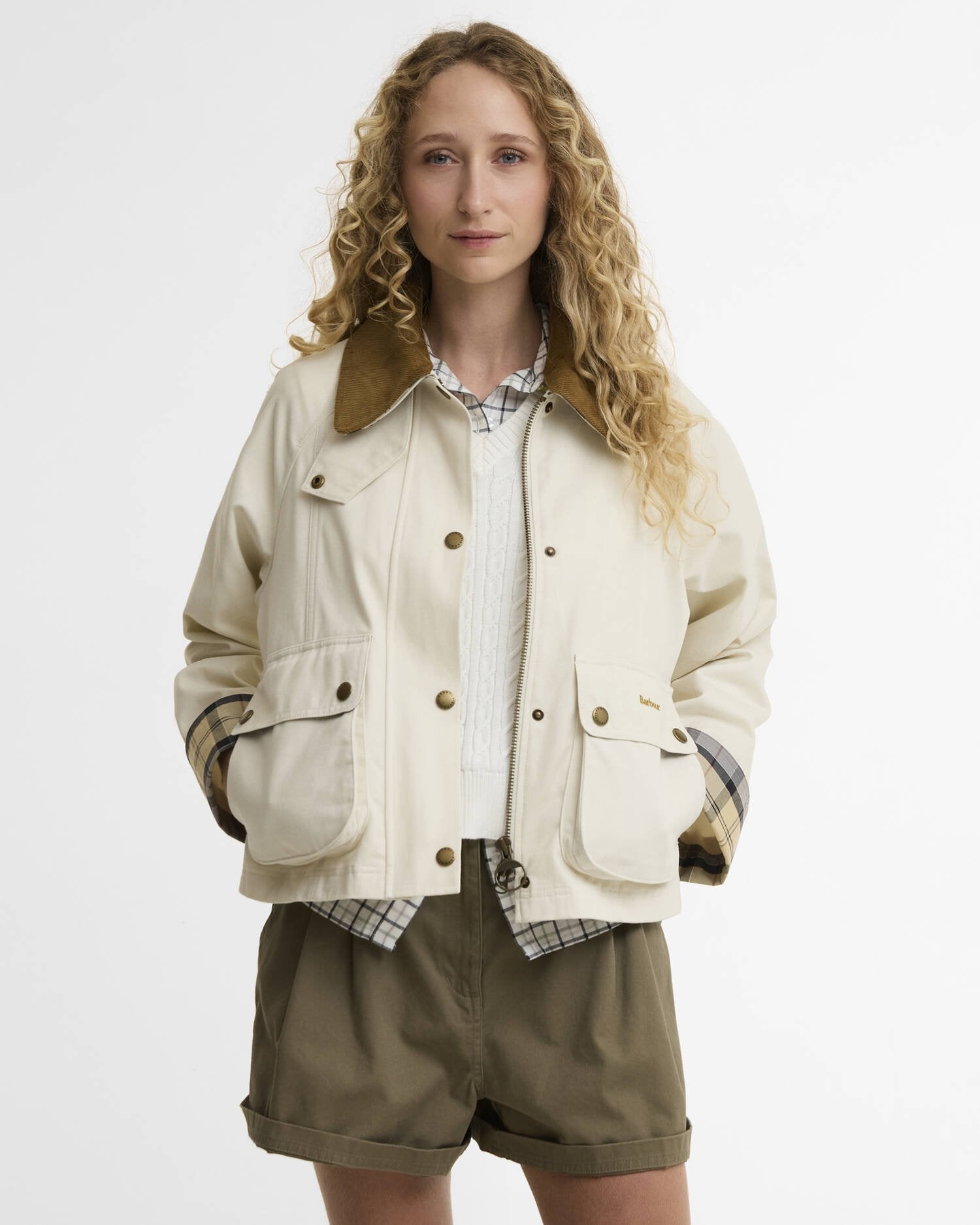 Cropped Beadnell Casual Jacket in beige cotton with cord collar and tartan cuffs styled casually