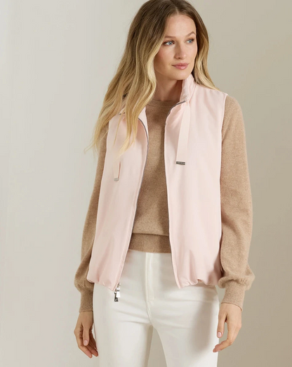 Woman wearing Robinson Air Vest in pink and beige by PETER MILLAR from HCO Women's Vests collection