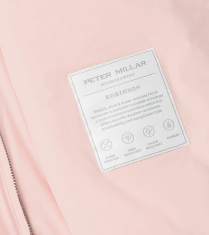 Close-up of Robinson Air Vest label on pink fabric highlighting stretch and weather resistance