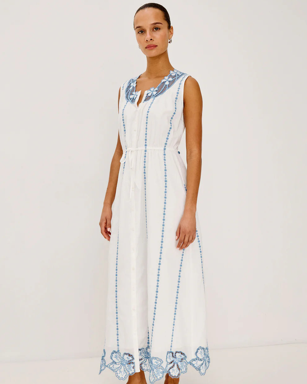 Lorina - White breezy cotton maxi dress with blue floral embroidery and adjustable waist ties