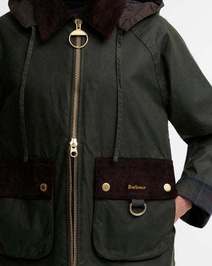 Olive green jacket with corduroy trim, brass zipper, and front pockets
