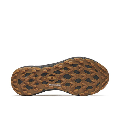 Shoe outsole with brown lug tread and Quantum Grip pattern