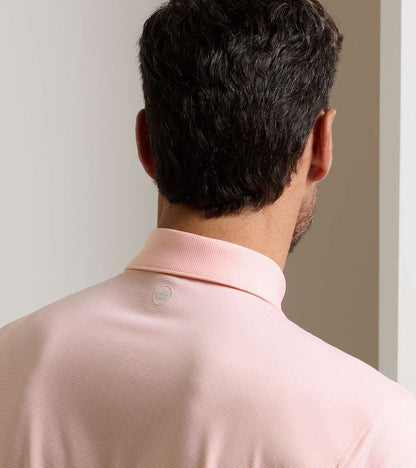 Jubilee Performance Jersey Polo - Summer Apricot in pink stripes with stretch and moisture-wicking features