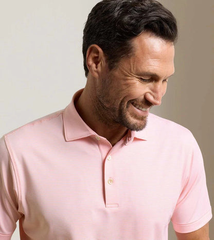 Jubilee Performance Jersey Polo - Summer Apricot in soft pink striped stretch fabric with moisture wicking