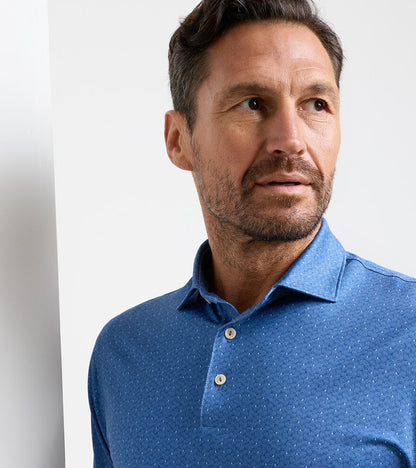 Negroni Performance Jersey Polo in blue geometric pattern with moisture wicking by PETER MILLAR