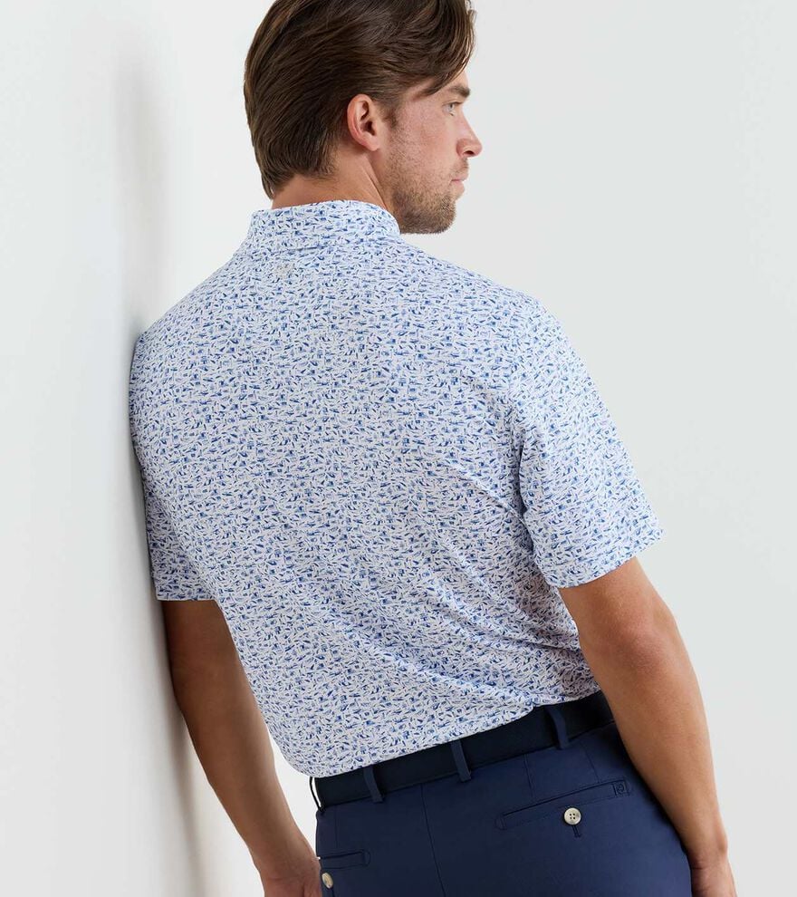 Coastline Performance Jersey Polo in blue geometric print with stretch, moisture wicking, UPF 50+ protection