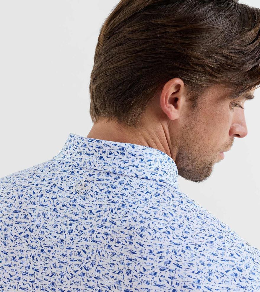 Coastline Performance Jersey Polo in blue geometric print with stretch and moisture-wicking fabric