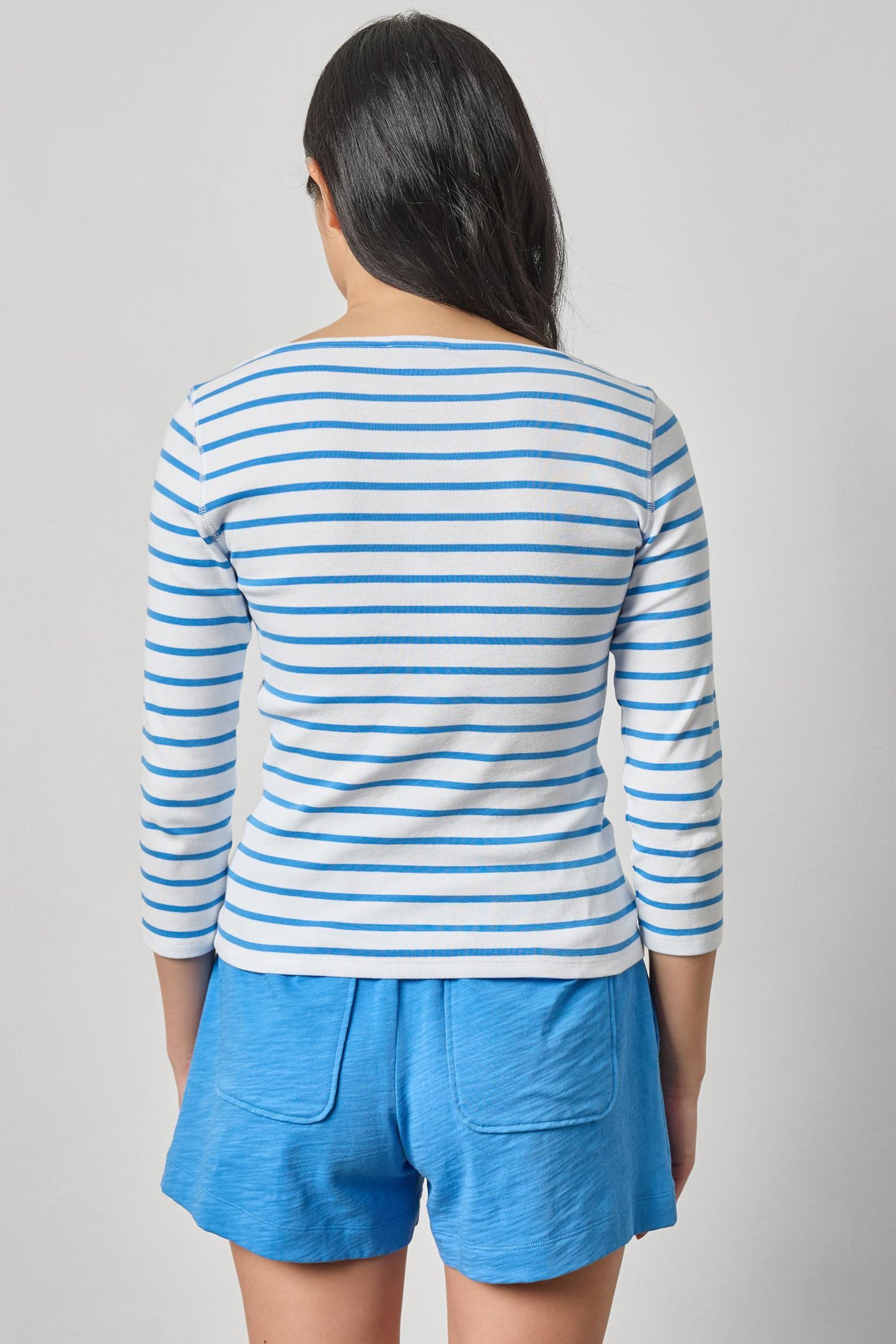 Rib Stripe 3/4 Boatneck by LILLA P with blue stripes, styled with relaxed blue shorts