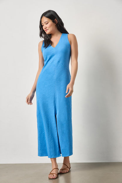 Model wearing LILLA P V-Neck Seamed Maxi Dress in blue textured knit, styled casually with sandals
