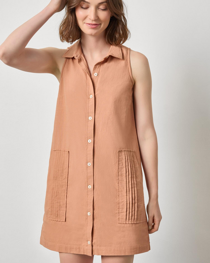 Sleeveless Pleat Pocket Dress in warm terracotta textured cotton by LILLA P, styled simply