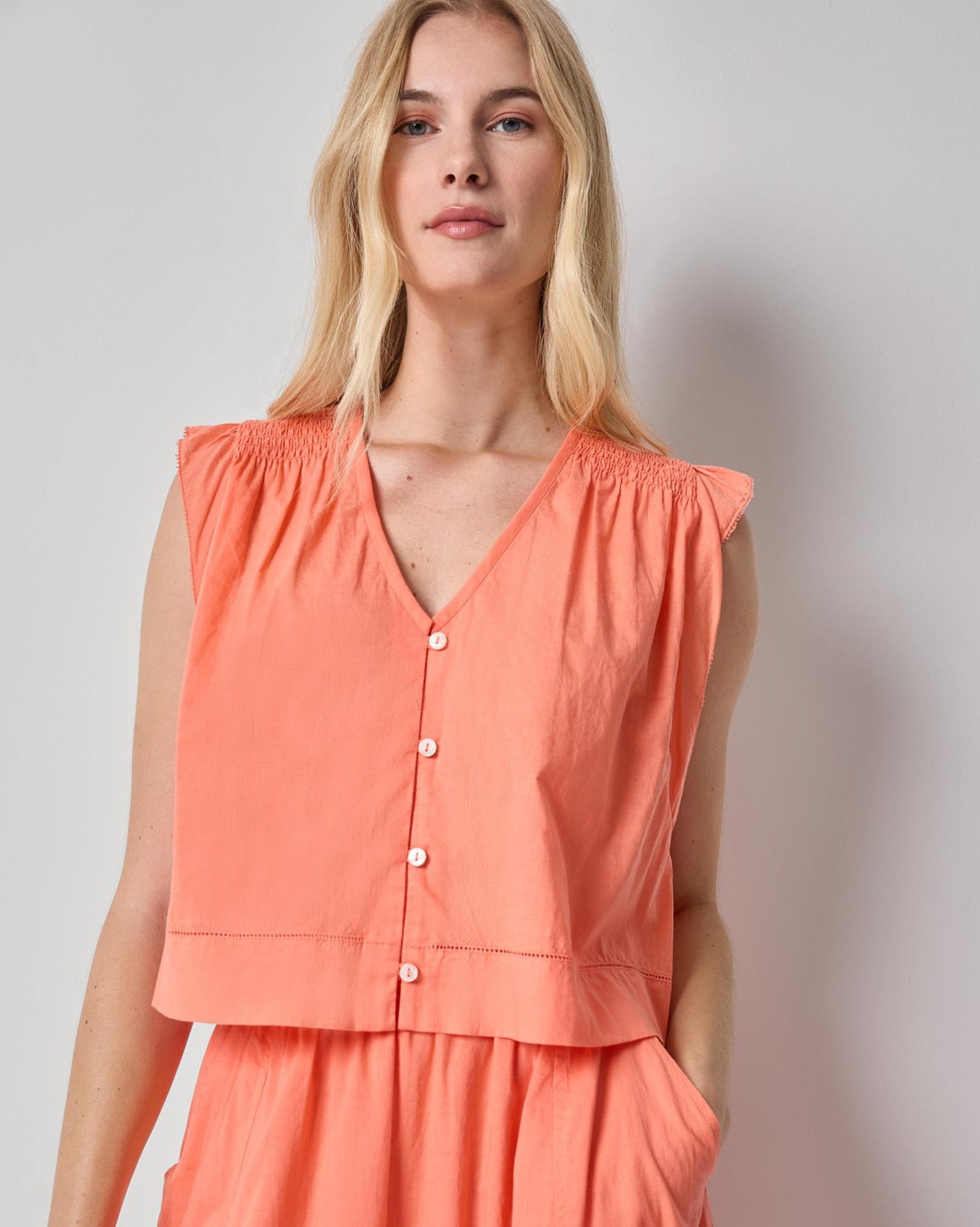 Smocked Shoulder V-Neck in orange cotton voile with smocked shoulders and button front by LILLA P