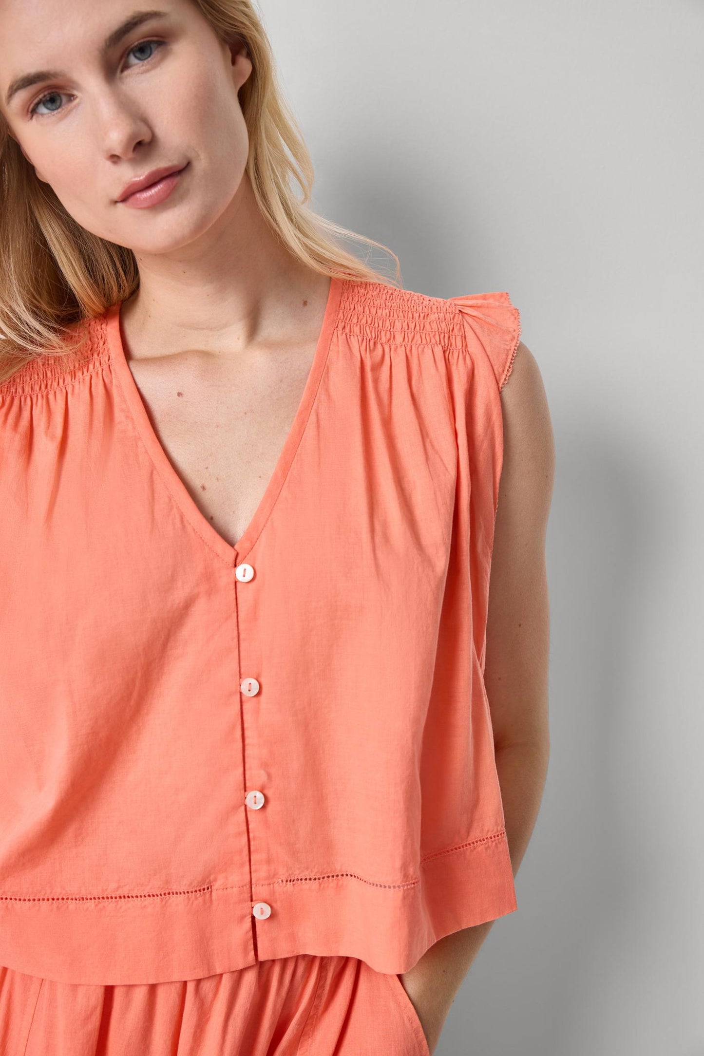 Smocked Shoulder V-Neck in orange cotton voile with button front by LILLA P, Fredericksburg boutique