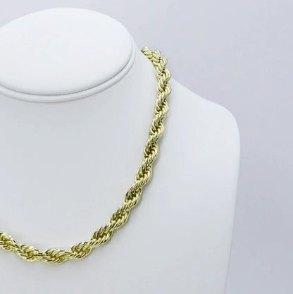 Gold chunky rope chain necklace, side view on a mannequin bust