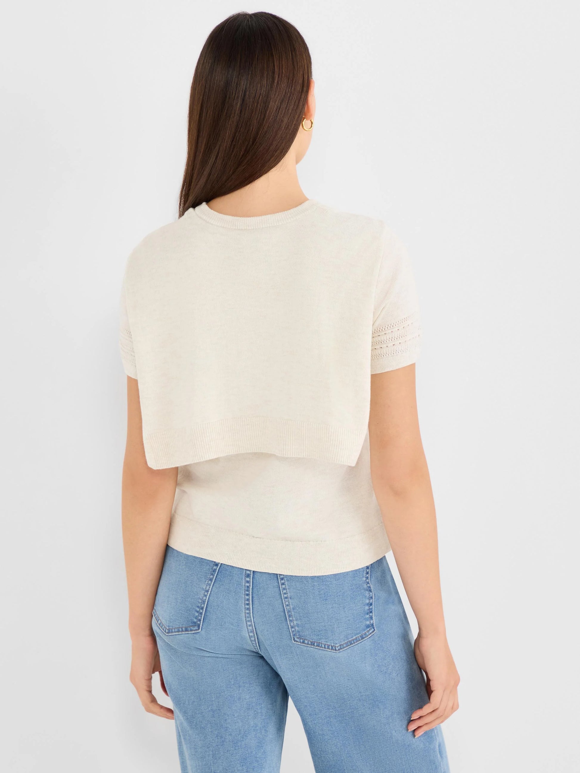Piazza Over The Shoulder Sweater in beige and white knit, styled on back view model