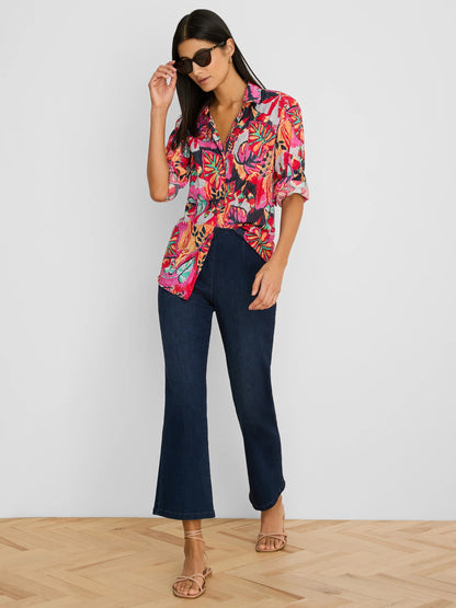 Kauai Garden Cotton Crinkle Shirt in vibrant floral stretch cotton, styled with dark denim pants