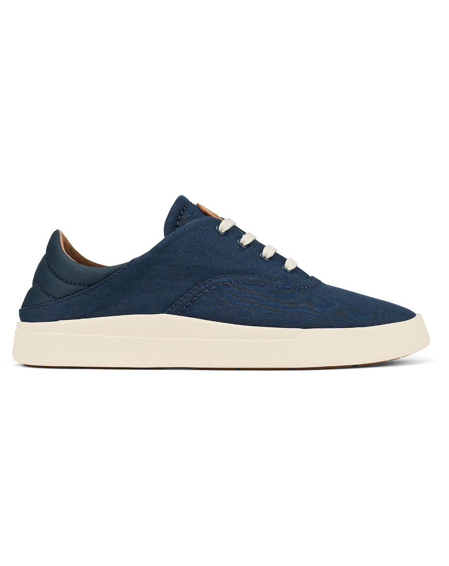 Navy canvas lace-up sneakers with white laces and cream rubber sole