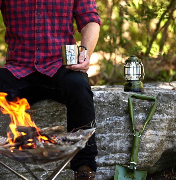 Carabiner Mug - One For The Road in silver stainless steel with black carabiner handle outdoors