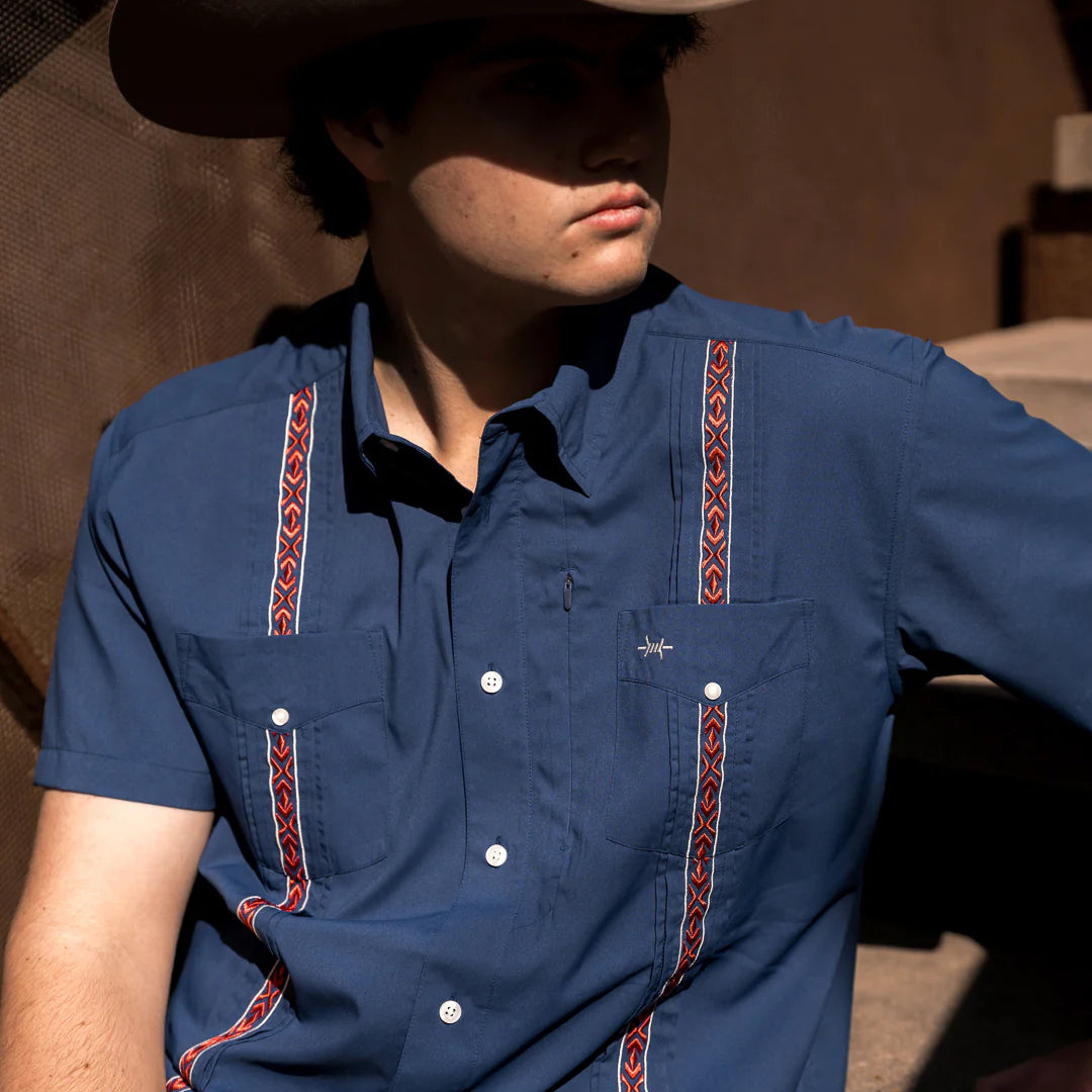 Guayabera Libre Libertad in navy with red and white geometric embroidery by TEXAS STANDARD
